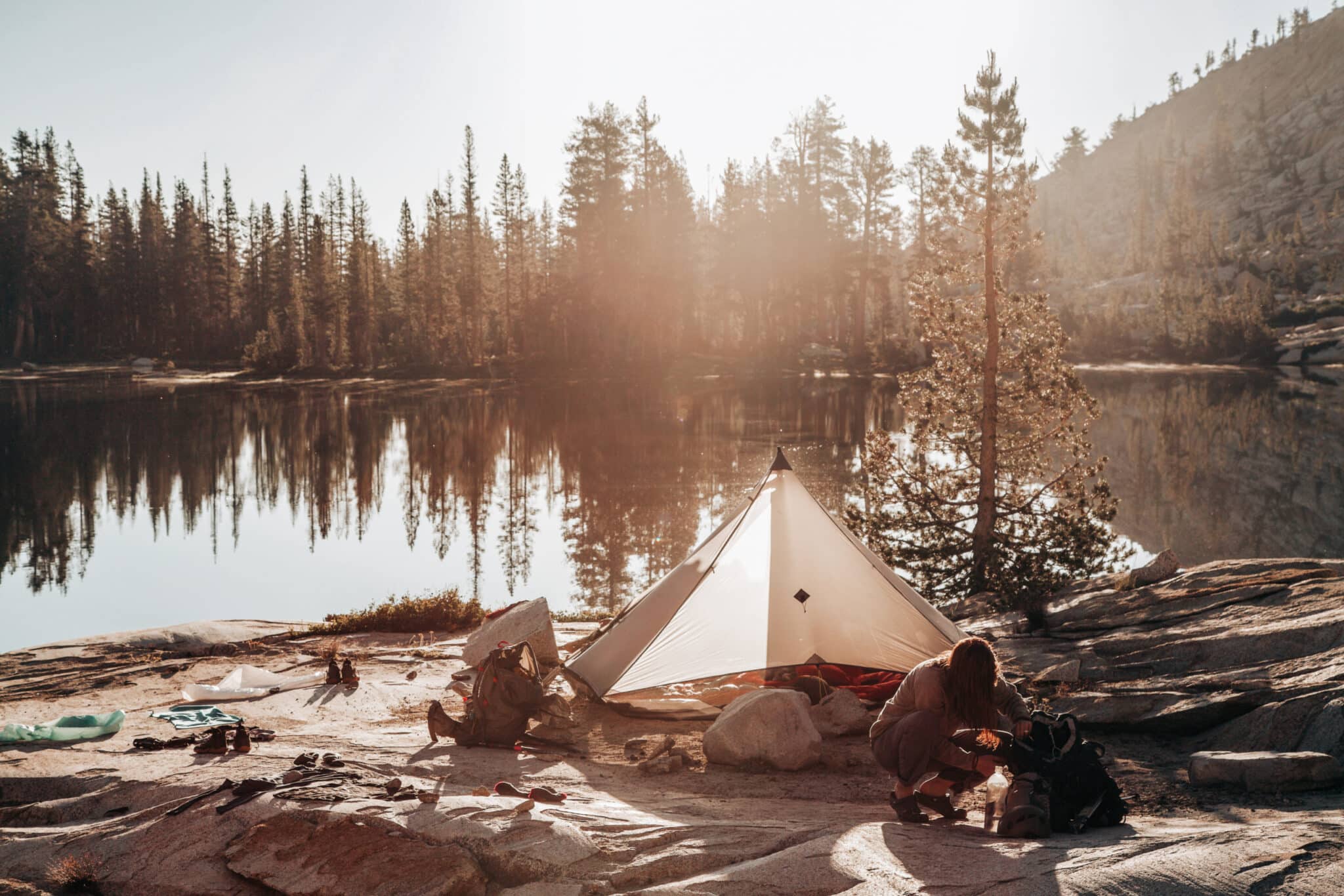 Tent by an alpine lake in Yosemite Wilderness