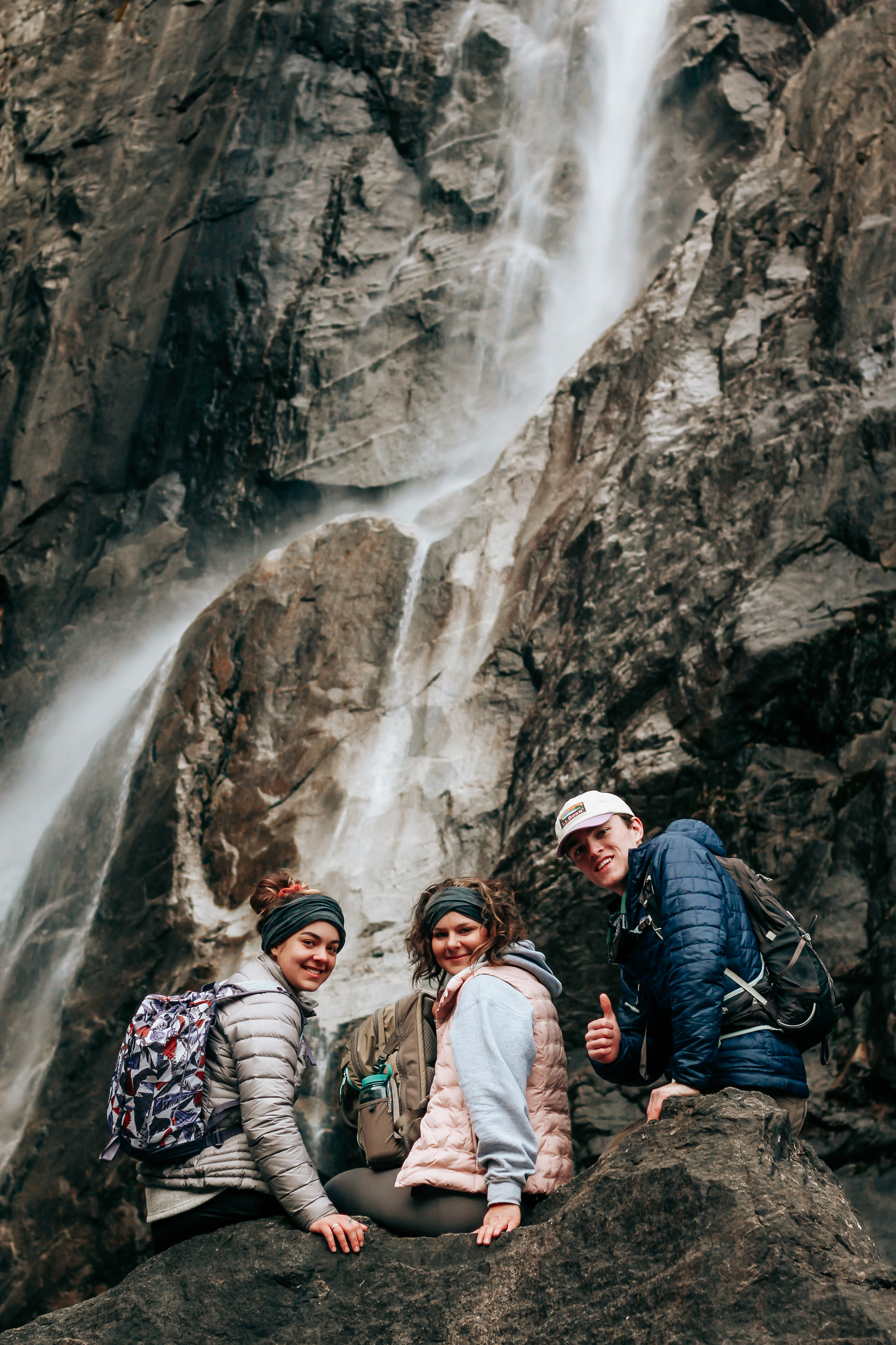 In front of Lower Yosemite falls in Yosemite National Park Summit Adventure Semester Program